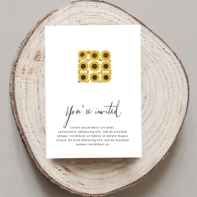 Invitation card with floral design and placeholder text.