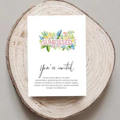 "SUNKISSED" invitation with floral accents and placeholder text.