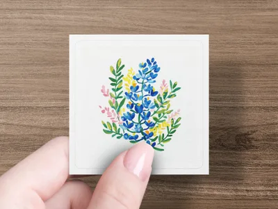 Watercolor illustration of blue and yellow flowers and greenery on a white card.
