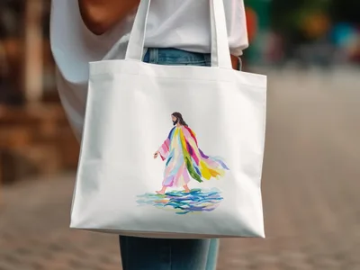 White tote bag with watercolor painting of Jesus walking on water.