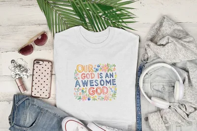 White t-shirt with "Our God is an Awesome God" floral text design.