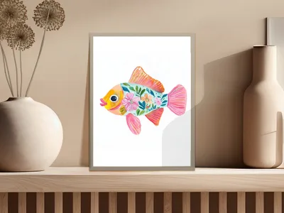 Colorful floral fish illustration in a white frame on a shelf.