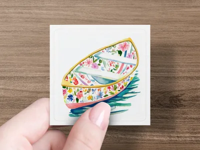 Watercolor painting of a floral rowboat on blue water.