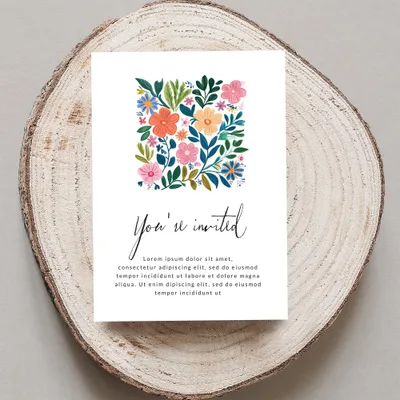 Invitation card with floral design and "You're invited" text.