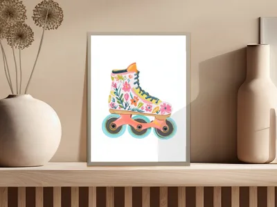 Roller skate with floral pattern on a shelf with a vase.