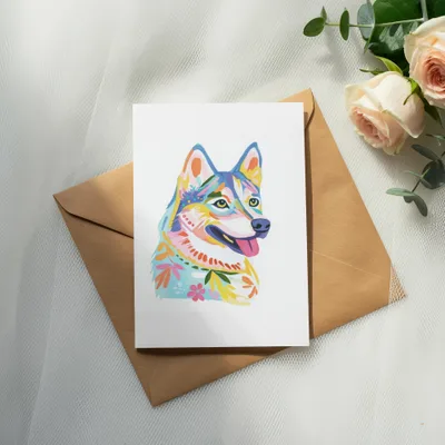 Card with colorful dog illustration on brown envelope with roses.