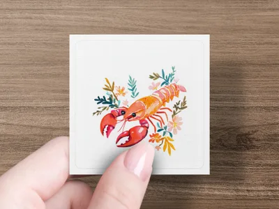 Lobster illustration with floral accents on a white square.