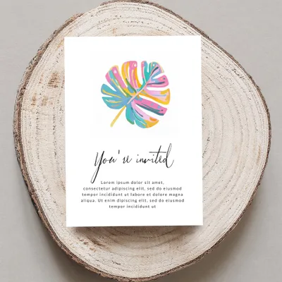 Invitation card with "You're invited" text and a colorful monstera leaf.