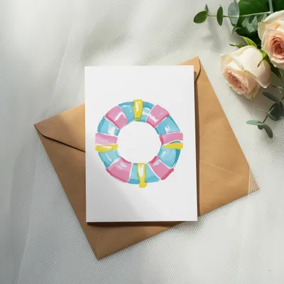 Watercolor illustration of a life preserver on an envelope with roses.