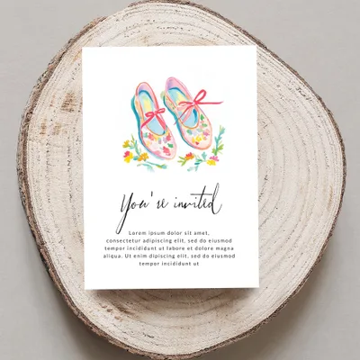 Ballet slippers with ribbon, floral accents, and "You're invited" text.