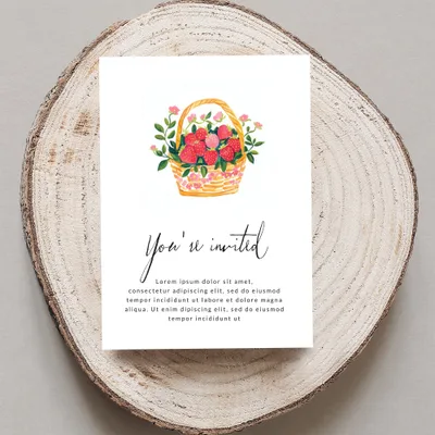 Invitation card with watercolor strawberries in a basket and "You're invited" text.