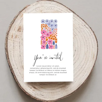 Invitation card with floral design and "You're invited" text.
