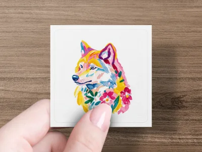 Watercolor wolf portrait with colorful flowers.