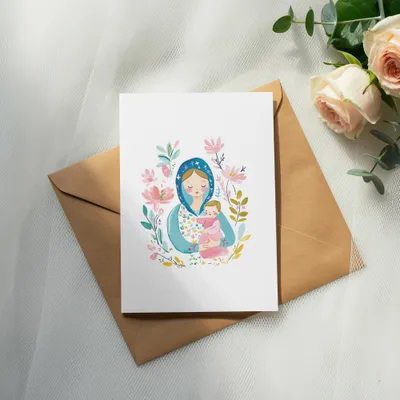 Card with mother and baby illustration on brown envelope, surrounded by roses.