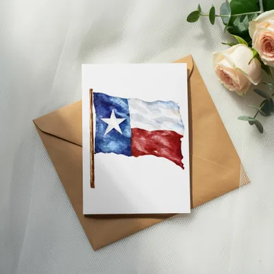 Watercolor Texas flag on card over envelope with roses.