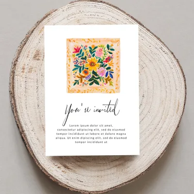 Invitation card with floral design and "You're invited" text.