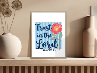 Framed artwork with "Trust in the Lord Proverbs 3:5" text and a red flower.