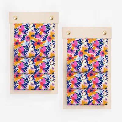 Two fabric swatch displays with a colorful floral pattern.