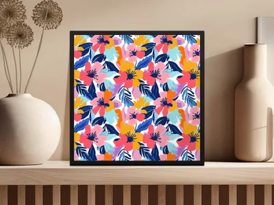 Framed artwork featuring a colorful floral pattern on a wooden shelf.