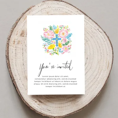 Invitation with "You're invited" and floral cross design.