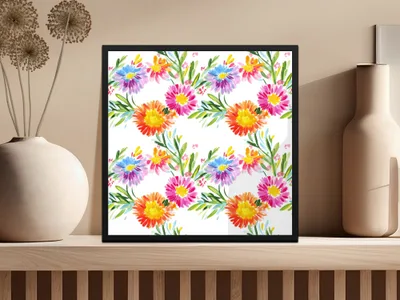 Framed artwork with colorful floral watercolor pattern on a shelf.