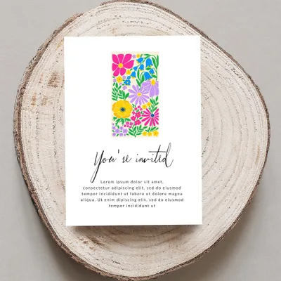 Floral invitation card with "You're invited" text.