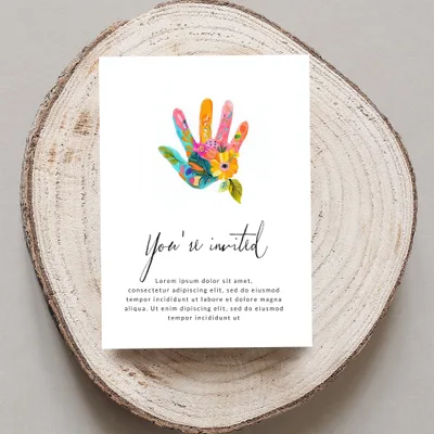 Invitation with "You're invited" and colorful handprint.