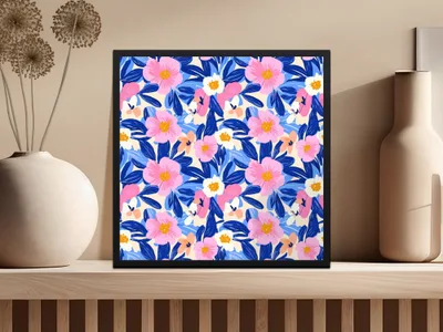 Floral pattern art print with pink, blue, and white flowers in a black frame.