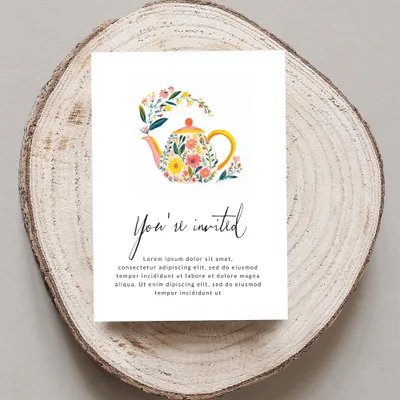Invitation with floral teapot and "You're invited" text.