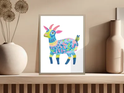 Colorful folk art goat illustration with floral patterns in a framed print.