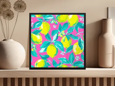Framed artwork with a pink background and a vibrant lemon and teal leaf pattern.
