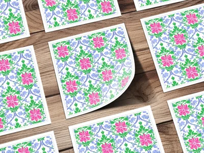 Floral pattern with pink flowers and blue vines on white cards.