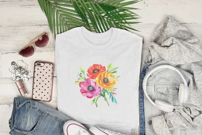 White t-shirt with watercolor poppies bouquet, sunglasses, headphones, and jeans.