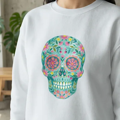 White sweatshirt with colorful floral skull design.