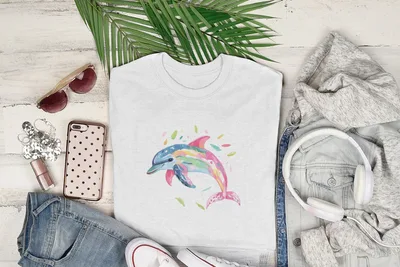 White t-shirt with a colorful watercolor dolphin graphic.