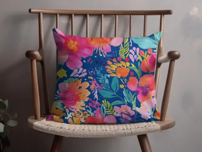 Colorful Floral Pattern Throw Pillow on Wooden Chair