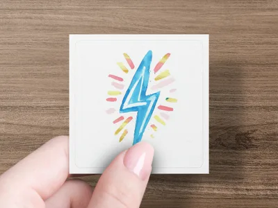 Hand holding a square card with a blue lightning bolt illustration.