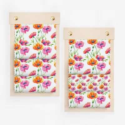 Fabric swatch samples with a repeating watercolor poppy floral pattern.