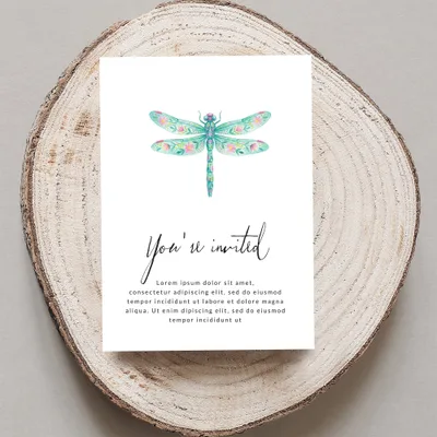 Invitation card with colorful dragonfly and placeholder text.