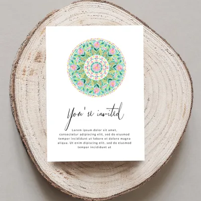 Invitation card with floral mandala and placeholder text.