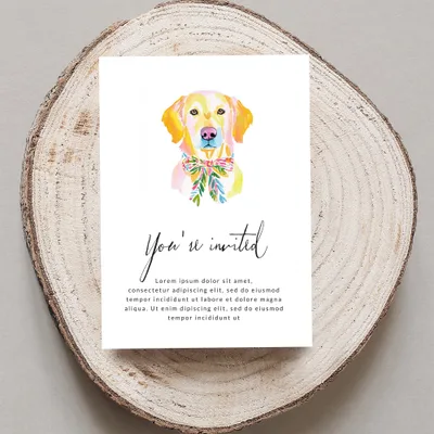 Invitation with watercolor dog wearing a floral bow and "You're invited" text.