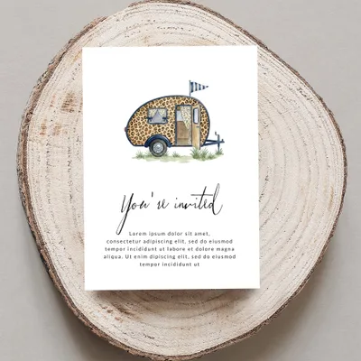 Invitation card with a watercolor caravan illustration and placeholder text.