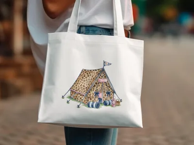 White tote bag with illustration of a leopard print tent with camping gear.