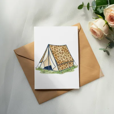 Card with leopard print tent illustration on brown envelope.