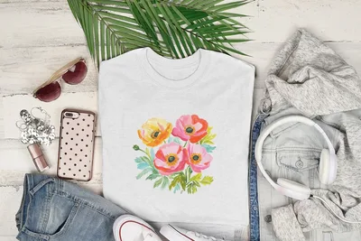 White t-shirt featuring a watercolor bouquet of pink, orange, and yellow poppies.