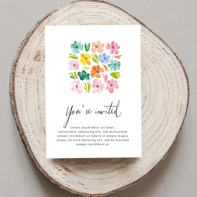 Invitation card with floral design and "You're invited" text.