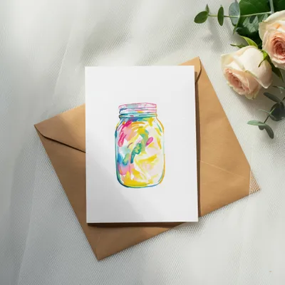 Watercolor illustration of a colorful jar on a brown envelope with roses.