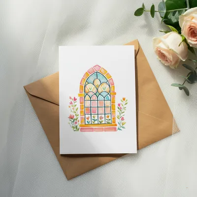 Greeting card featuring a watercolor painting of a colorful arched window with flowers.