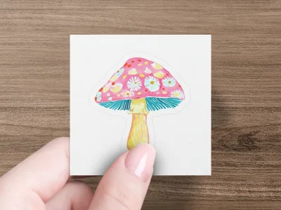 Pink mushroom sticker with blue and yellow floral accents.
