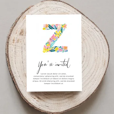 Floral letter Z on "You're invited" card with placeholder text.